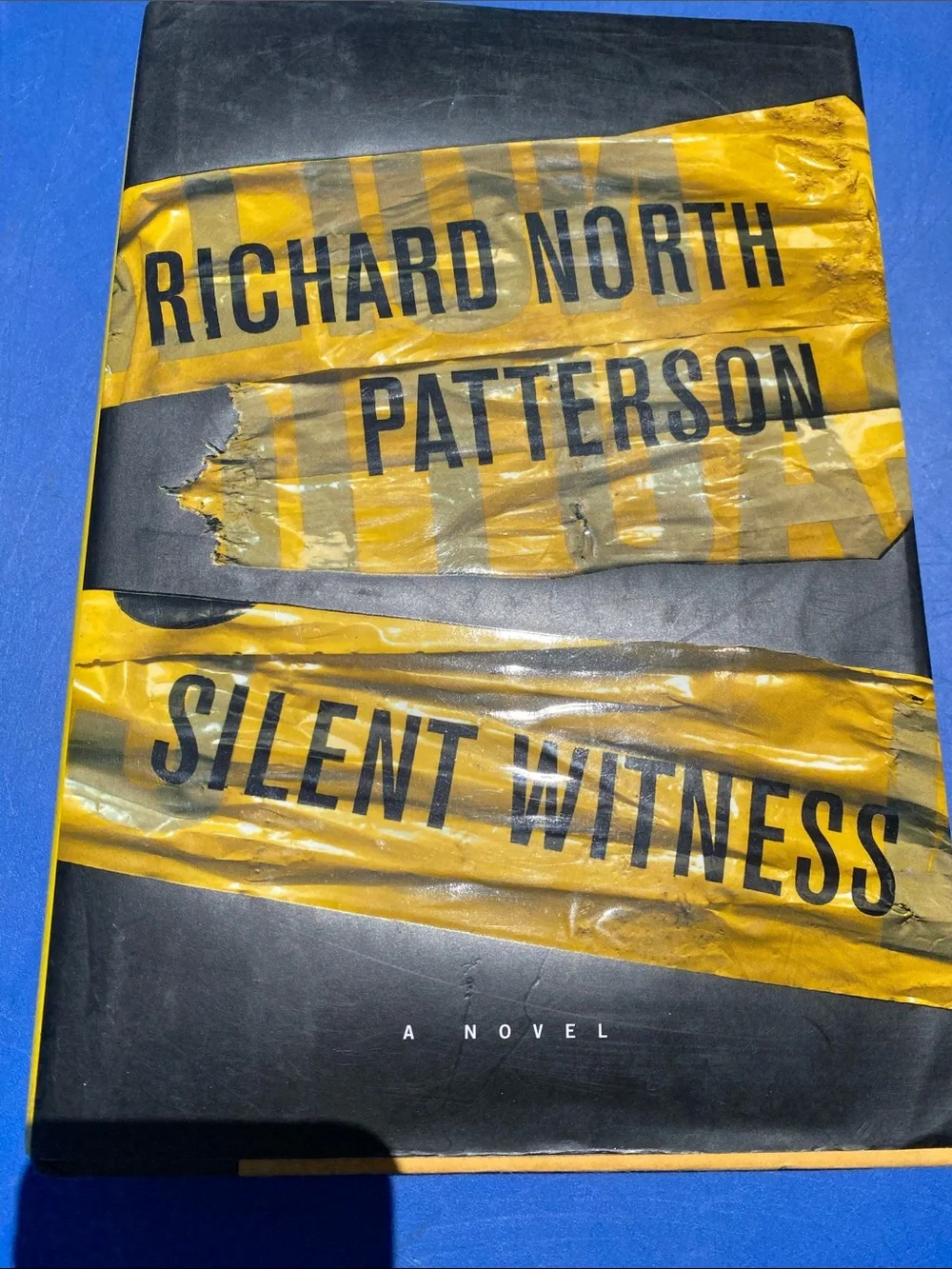 Silent Witness - Black & Yellow Hardcover Novel